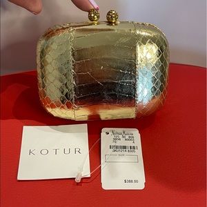 Kotur Gold Evening Clutch
This item has never been worn, perfect condition
